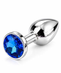 Plug anal joia de metal prateado com corpo cônico, acabamento brilhante e pedra azul na base.